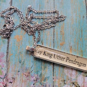 King Uther Pendragon pendant necklace made with King Arthur book pages