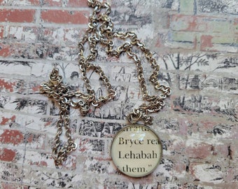 Bryce and Lehabah 20mm pendant necklace made with House of Earth and Blood book pages