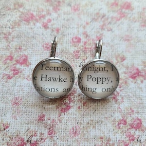 Hawke and Poppy pendant earrings made from From Blood and Ash book pages