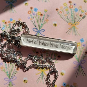 Chief Nash pendant necklace with from Things We Hide From the Light book pages
