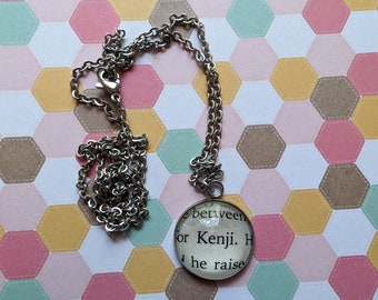 Kenji 20mm pendant necklace made with Shatter Me book pages