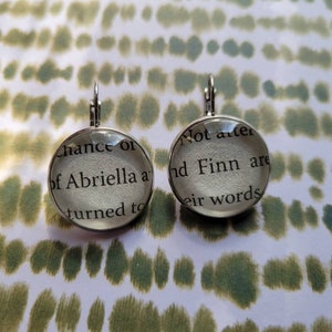 Abriella and Finn pendant earrings made with These Hollow Vows book pages