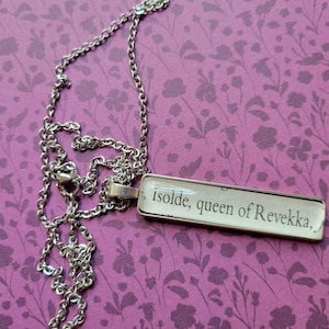 Queen Isolde pendant necklace made with King of Battle and Blood book pages