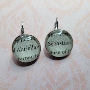 Abriella and Sebastian pendant earrings made with These Hollow Vows book pages