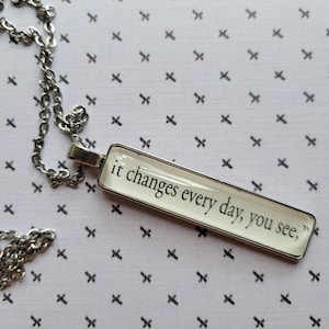 The News Again pendant necklace made with Harry Potter book pages