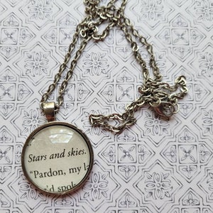 Stars and Skies pendant necklace made with Crier&#39;s War book pages