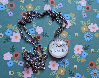 Violet and Xaden 20mm pendant necklace made with Fourth Wing book pages