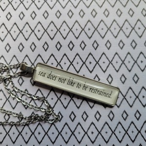 The Sea Does Not Like to be Restrained rectangle pendant necklace made with Percy Jackson book pages