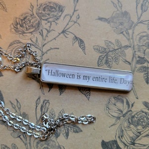 Halloween is My Entire Life pendant necklace made with Haunting Adeline book pages