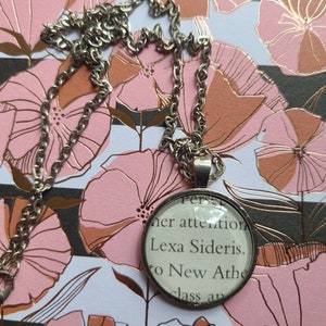 Lexa Sideris pendant necklace made from Touch of Darkness book pages