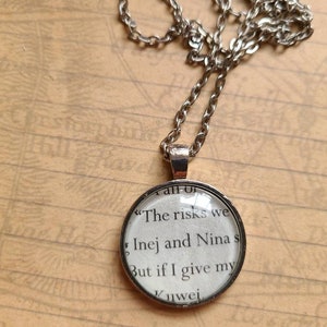 Inej and Nina Zenik pendant necklace made with Six of Crows book pages