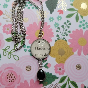 Hades pendant with charm necklace made with book pages