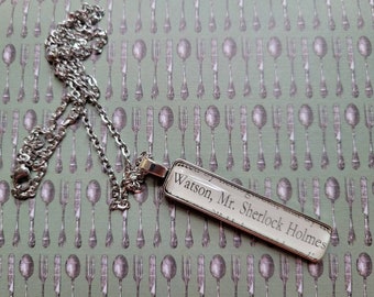 Watson Meets Sherlock pendant necklace made with Sherlock Holmes book pages