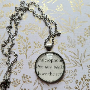 Thee Love Books pendant necklace made with Hell Bent book pages
