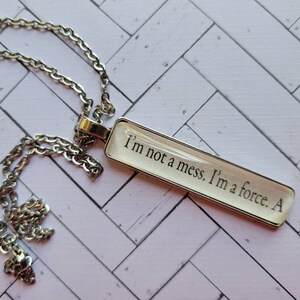 I'm Not a Mess I'm a Force pendant necklace made from Nature of Witches book pages