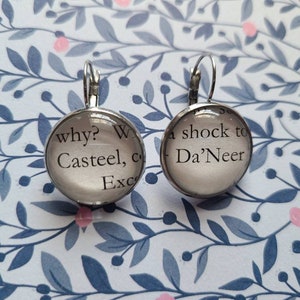 Casteel Da&#39;Neer pendant earrings made with From Blood and Ash book pages
