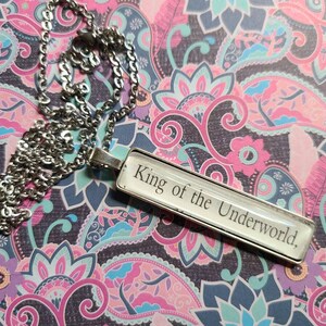 King of the Underworld pendant necklace made from Touch of Darkness book pages