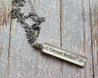 Gwyneth Berdara pendant necklace made from Court of Silver Flames book pages
