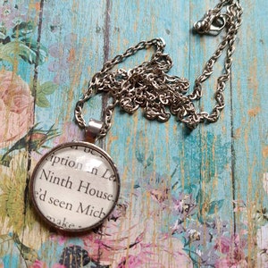 Ninth House pendant necklace made with Ninth House book pages
