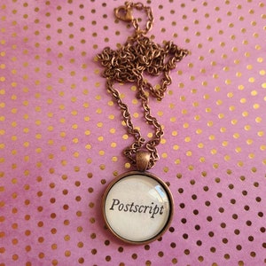 Postscript book page pendant necklace