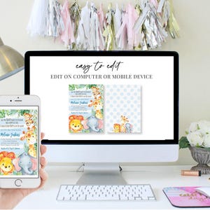 May include: A computer monitor and smartphone display a baby shower invitation design. The invitation features watercolor illustrations of jungle animals, including a lion, elephant, and giraffe. The text "easy to edit" is displayed on the monitor.