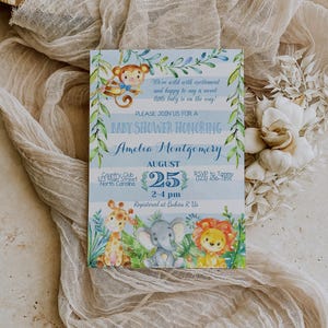 May include: A blue and green baby shower invitation with a jungle theme. The invitation features a monkey, giraffe, elephant, and lion. The text on the invitation reads "Baby Shower Honoring Amelia Montgomery, August 25, 2-4 pm, Country Club, 123 Main Street, North Carolina, RSVP to Tammy (123) 456-7891, Registered at Babies R Us."