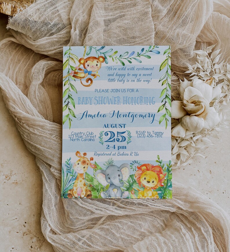 May include: A blue and green baby shower invitation with a jungle theme. The invitation features a monkey, giraffe, elephant, and lion. The text on the invitation reads "Baby Shower Honoring Amelia Montgomery, August 25, 2-4 pm, Country Club, 123 Main Street, North Carolina, RSVP to Tammy (123) 456-7891, Registered at Babies R Us."