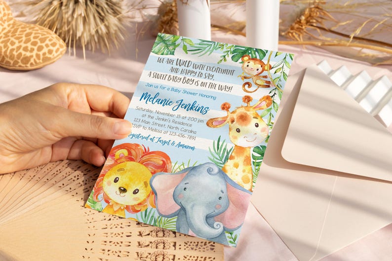 May include: A baby shower invitation featuring watercolor illustrations of jungle animals, including a lion, elephant, giraffe, and monkey. The invitation has text that reads "We are wild with excitement and happy to say, a sweet baby boy is on the way!"