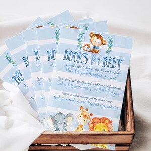 May include: Blue and white striped cards with a jungle animal theme. The cards say "Books for Baby" and ask guests to bring a book instead of a card.