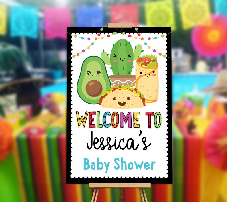 May include: Welcome to Jessica's Baby Shower sign with a black background and colorful text. The sign features a cartoon avocado, cactus, and burrito with smiling faces.