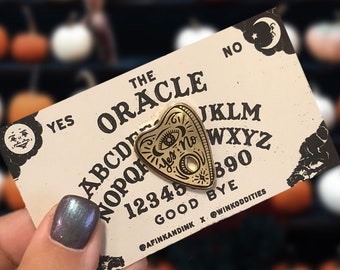 The Oracle - Ouija Planchette - Halloween Series Spooky Lapel Enamel Pins - 1.25" Hard Enamel - Black - Silver - Gold - Goth - Witchy