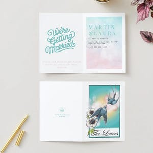 May include: Wedding invitation card with the words "We're Getting Married" in teal script. The inside features names, a church address, and RSVP information. The bottom panel has an illustration of two blue birds and the words "The Lovers".