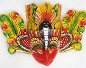 Wall mask Gurulu Raksha - Hand Kaduru wood (snake wood) carved natural paint handmade Sri-Lanka