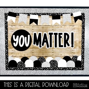 May include: Black and white bulletin board with a woodgrain background. The bulletin board has a black and white polka dot border and a banner with black and white triangles. The text "You Matter!" is displayed in black letters on a white circle.