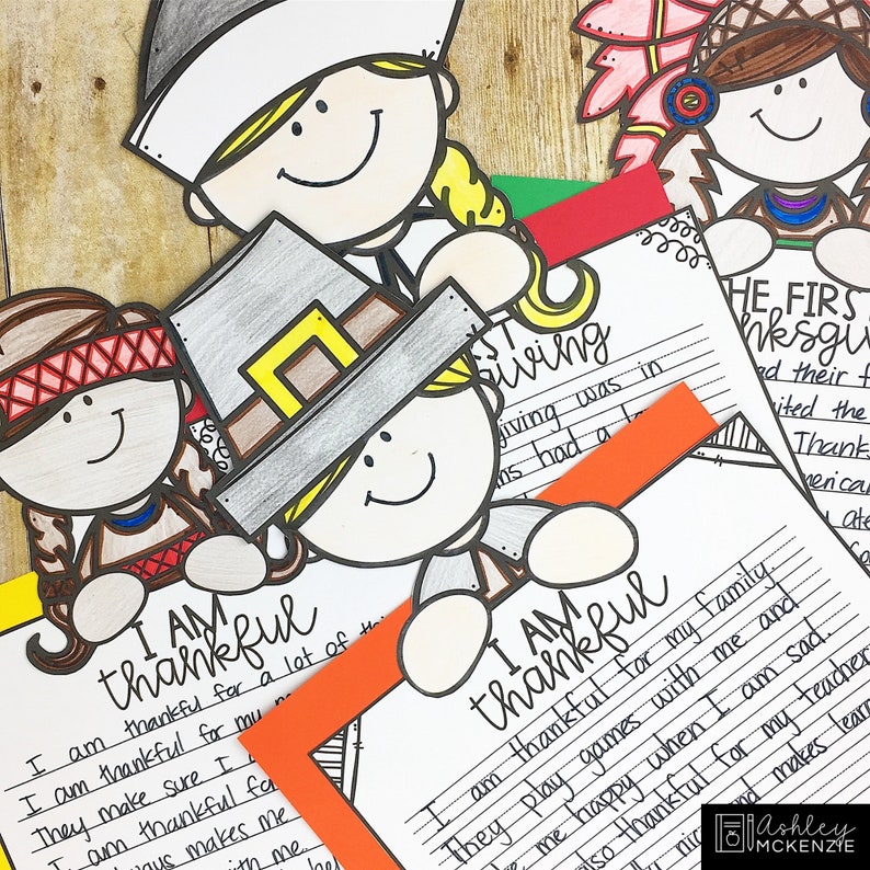 May include: Black and white printable Thanksgiving activity for kids. The printable features a pilgrim and an indigenous person holding a sheet of paper with the text "I am thankful" and a space to write. The printable also includes a sheet of paper with the text "The First Thanksgiving" and a space to write.