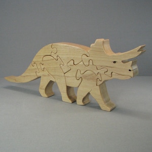 Large Triceratops 3 horned dinosaur, 7-piece freestanding 3D jigsaw puzzle for play or display, scroll saw fretwork in solid maple wood.