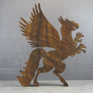 Hippogriff freestanding 3D jigsaw puzzle for desk or shelf display, mythical fantasy creature, solid Monkeypod wood, hand cut scroll saw art