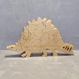 Large Stegosaurus dinosaur freestanding 3D jigsaw puzzle for play or shelf display, scroll sawn solid maple wood toy