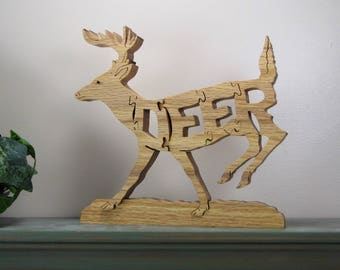 Running deer wood word art 3D jigsaw puzzle, freestanding for shelf or desk display, solid oak wood, hand cut scroll saw fretwork