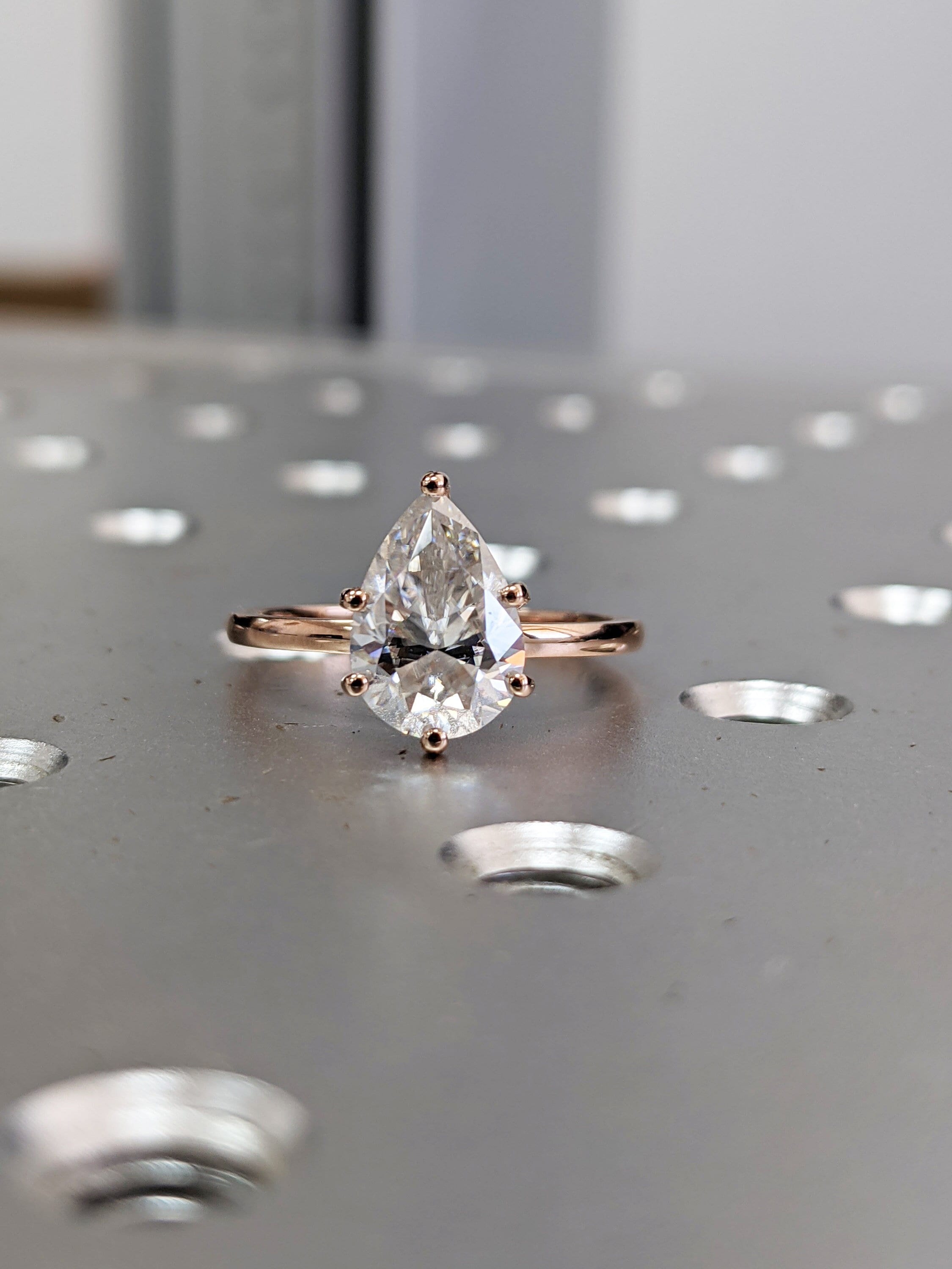 Drop shaped engagement ring deals