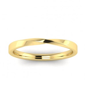 May include: A simple gold wedding band with a twisted design.