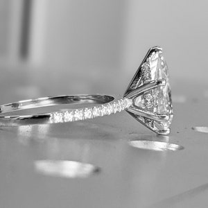 2.5 carat pear engagement ring skinny pear moissanite 11.5x7.2 1.6 ratio 1.6mm thin band & hidden halo diamond ring