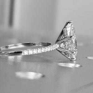 2.5 carat pear engagement ring skinny pear moissanite 11.5x7.2 1.6 ratio 1.6mm thin band & hidden halo moissanite ring