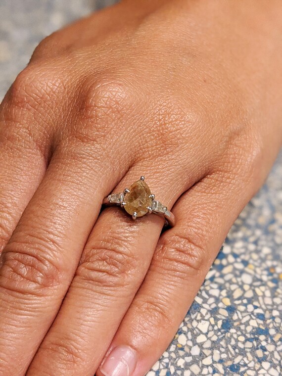Pear shaped diamond with shop tapered baguettes