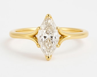 Anillo de compromiso con diamantes cultivados en laboratorio con corte marquesa y certificación IGI, con cuerpo dividido, ideal para bodas y aniversarios.