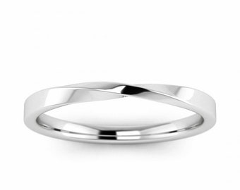 May include: A simple, silver, twisted wedding band.