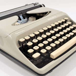 Retro Remington Premier Sperry Rand Máquina de escribir portátil con case/Mid century Working Typewriter