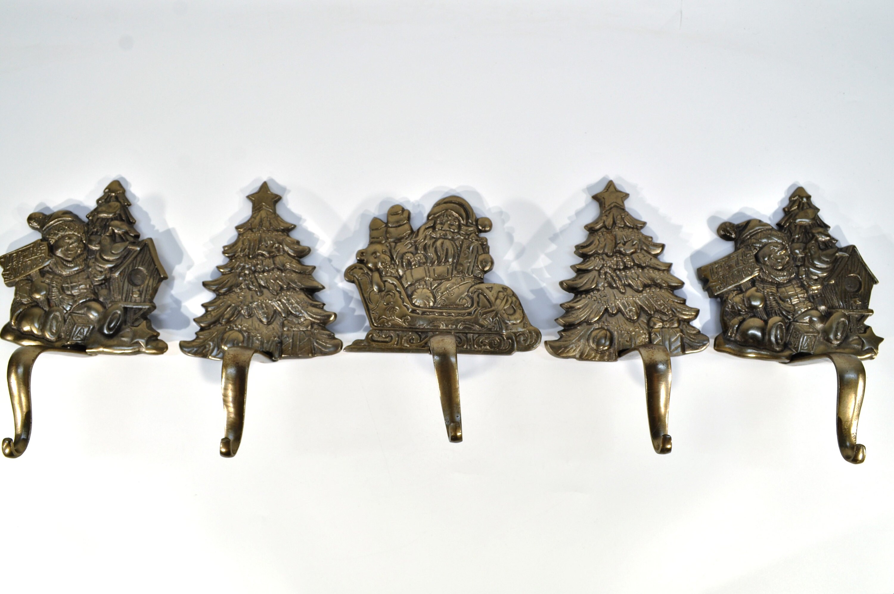Only one stocking holder is available: Let It Snow/Large Heavy Cast Iron Christmas Stocking Holders. The price is per one item