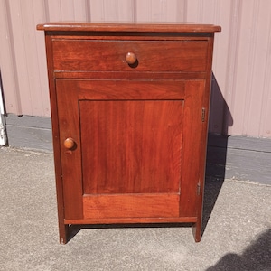 May include: A set of three ceramic mugs with a speckled, matte finish. The mugs are in shades of cream, light gray, and dark gray. Each mug has a simple, modern design and a rounded handle.