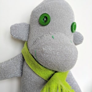 Christmas handmade sparkly silver sock monkey.  Soft plush toy monkey with green scarf